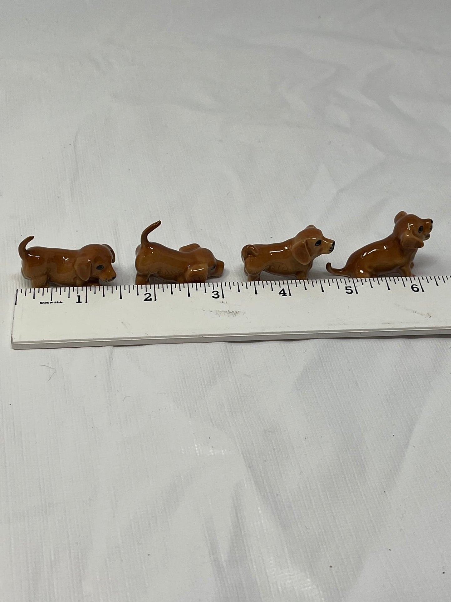 Set of 4 Miniature Ceramic Puppy Figurines – Brown, Hand-Painted