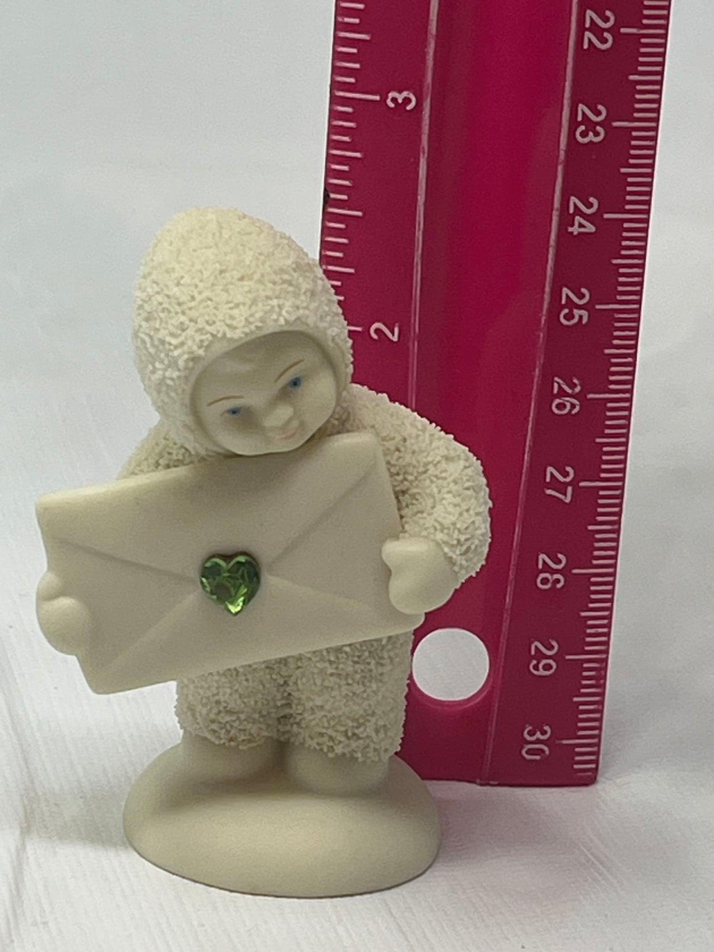 Snowbabies Figurine – Child with Envelope & Green Heart Jewel