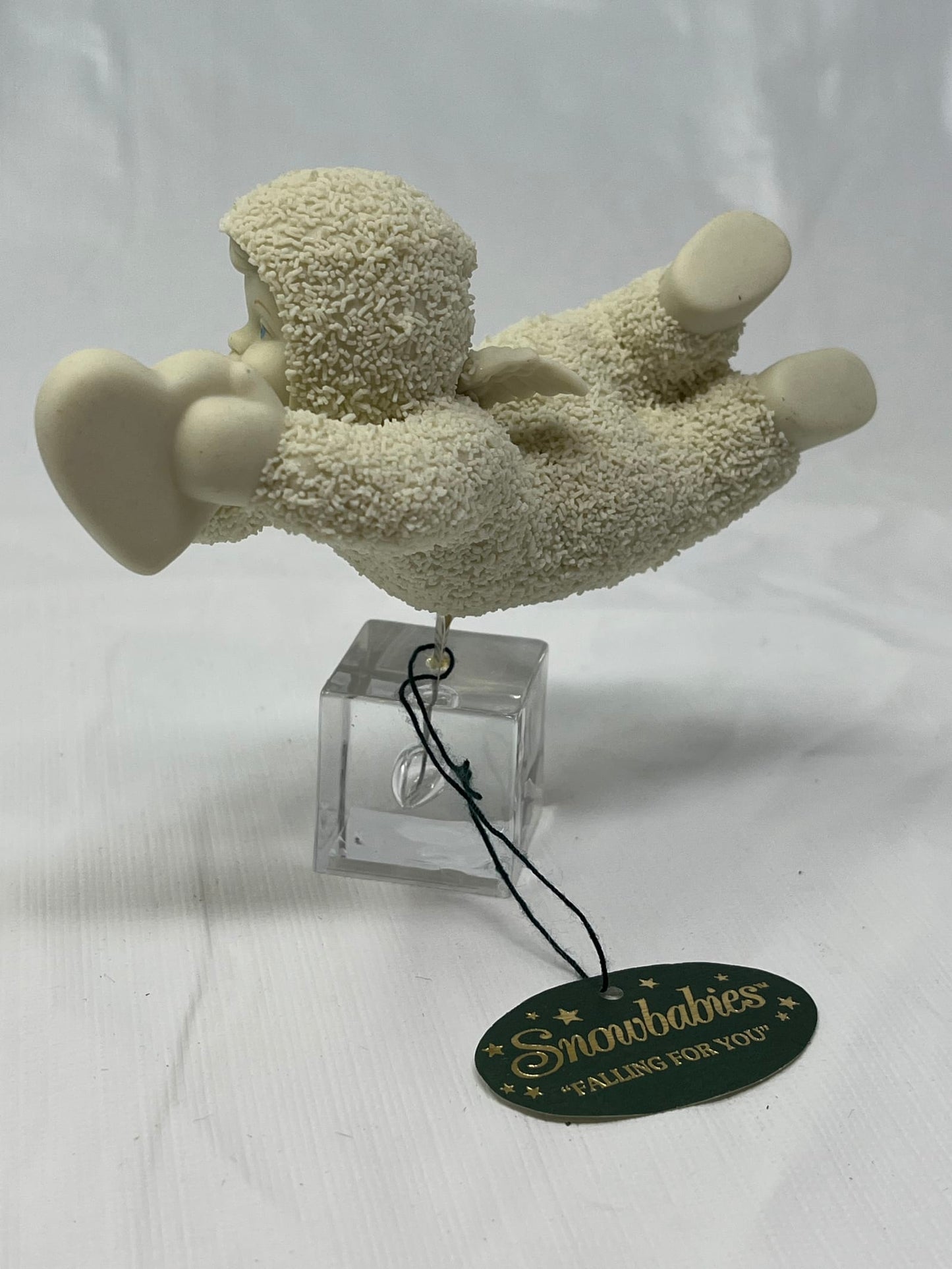 Snowbabies Figurine “Falling for You” – Dept 56, 1999